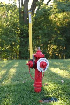 image of red post hydrant for maintenance