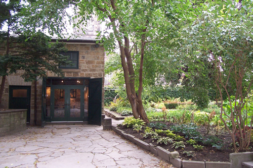 Stone house surrounded by trees