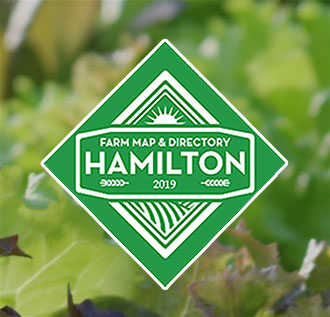 Logo Farm Map & Directory Hamilton with a lettuce farm in the background