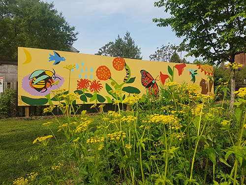 York Boulevard Golden Alexanders mural of bees and butterflies