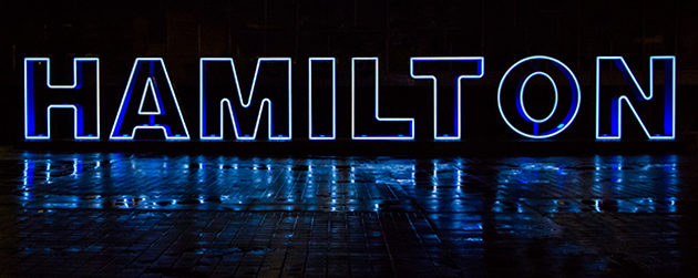 Hamilton sign at night lit blue