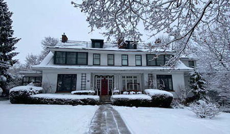 Home in winter after a snowfall