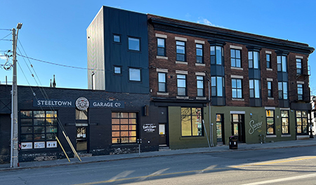 3 story mixed use brick building