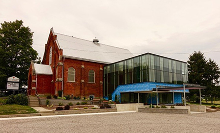 Brick church with glass addition