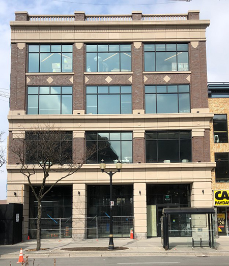 3 story brick mixed use building