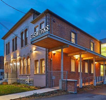 Brick 2 story building with letters Gas Works over entrance