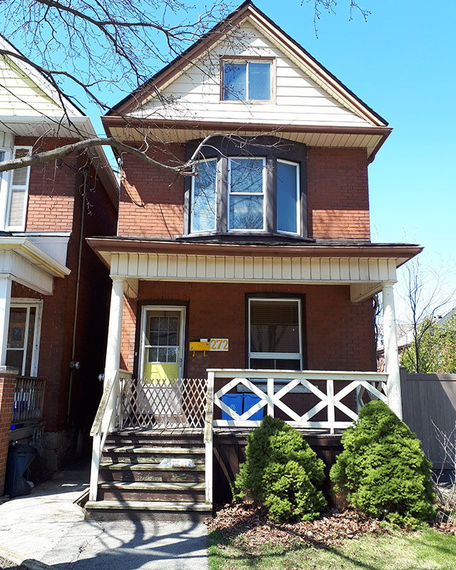 Street view of 2 storey red brick house on 272 Sherman Avenue South, Hamilton