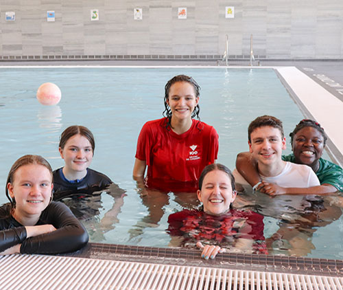 6 youth in swimming pool training