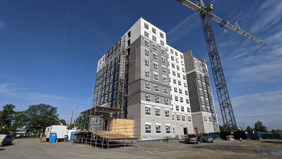 8 Roxanne Dr. Construction photo with crane