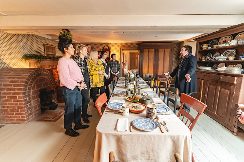 People on a tour of Dundurn Castle's kitchen 