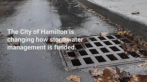 Image of storm sewer during rain storm