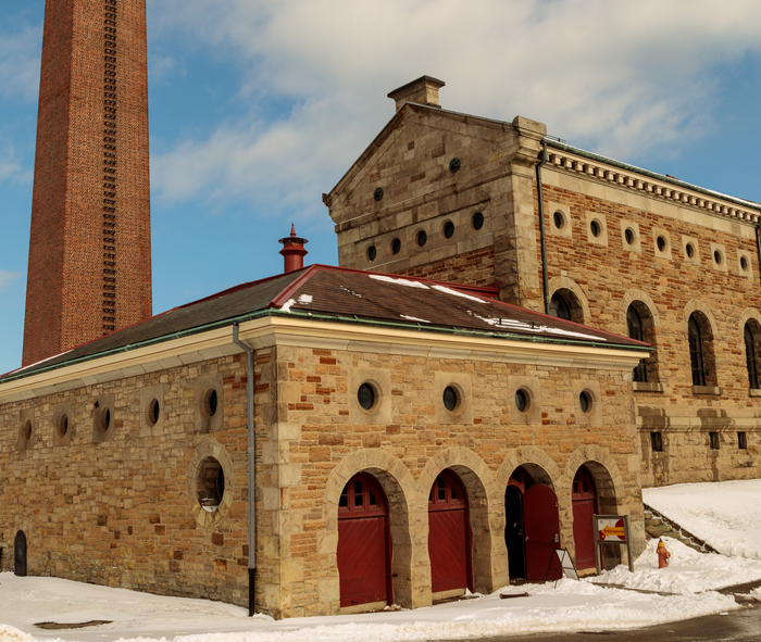 Steam museum exterior with snow on the ground