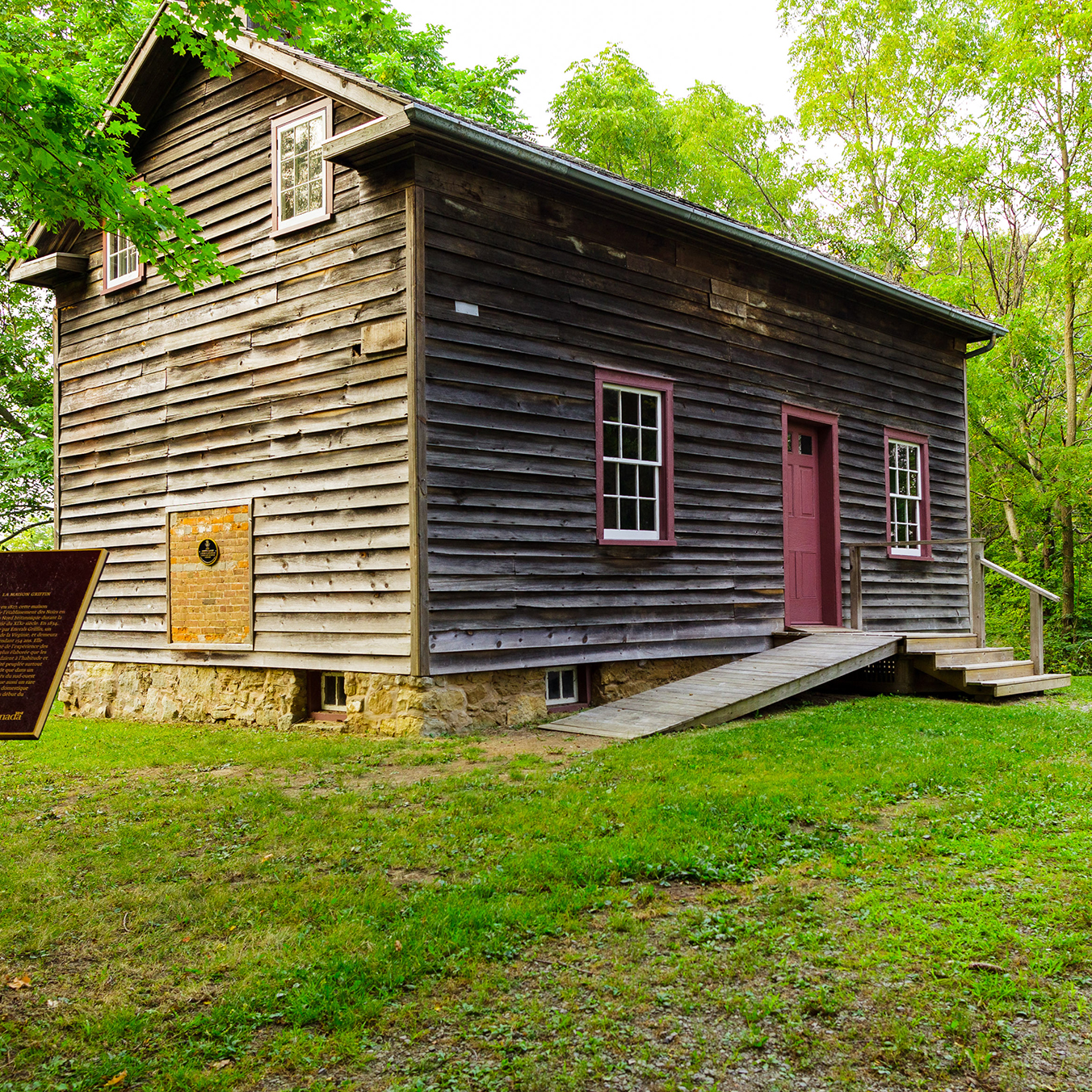wood clad cabin in forest