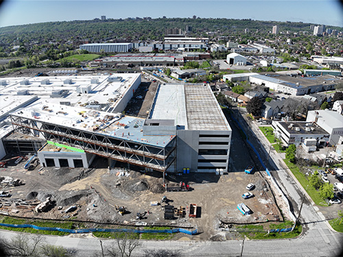 Close-up view of the overhead administration building that connects the parking structure to the maintenance/storage building.