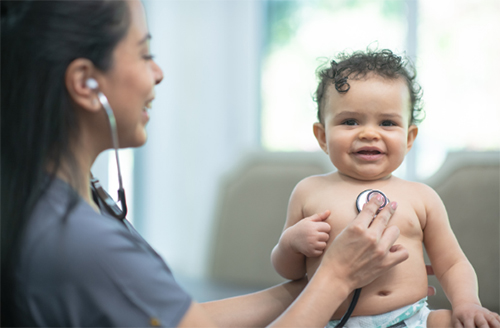 Doctor checking baby
