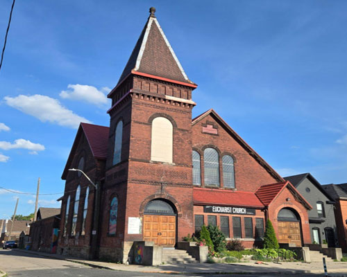 Romanesque Revival red brick church