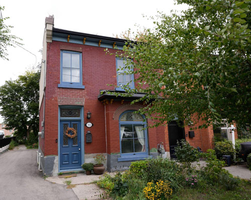 Italianate-influenced row house with restored windows