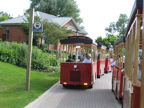 Hamilton Waterfront Trolley Tour full of people on a sunny summer day