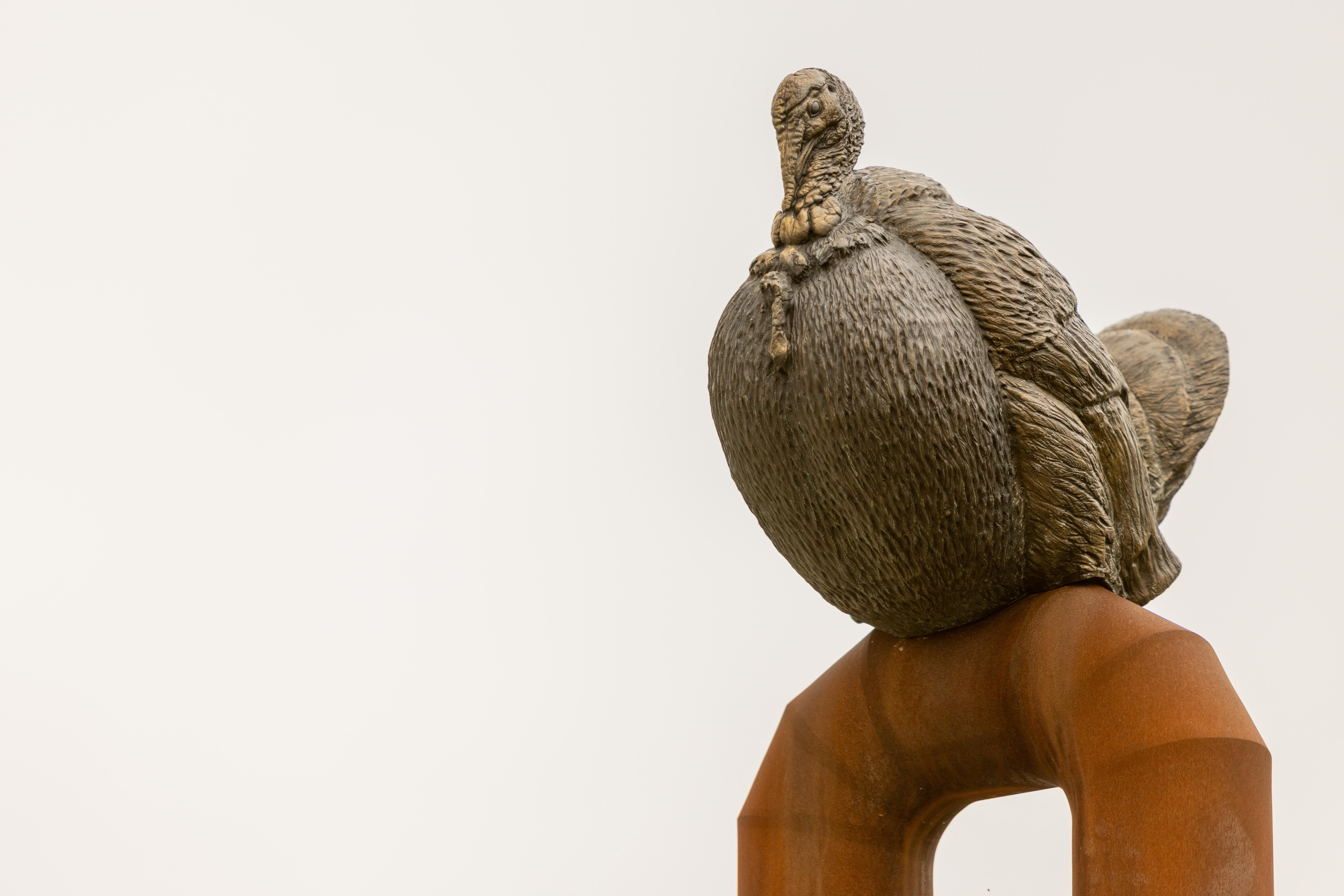 turkey sculpture on pole - part of "A Shared Trail" by Brandon Vickerd