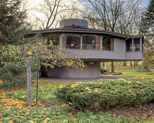 Dodecagon house with 12 equal sides supported by concrete cylinder