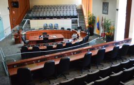 Empty City Council Chambers, gallery seating and meeting circle