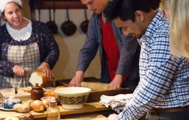 Two men cooking in Dundurn Historic Kitchen