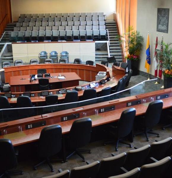 Empty City Council Chambers, gallery seating and meeting circle