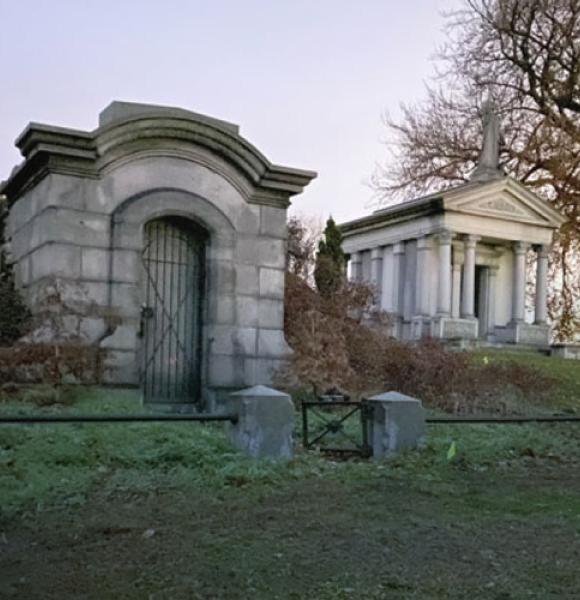 Stone crypt on grassy hill