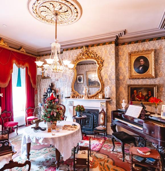 Formal room of historic Whitehern home decorated for Christmas holidays
