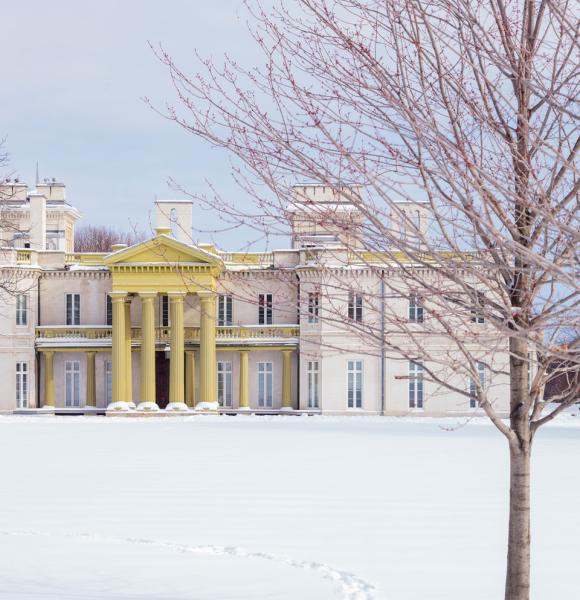 Dundurn castle in winter, surrounded by snow.