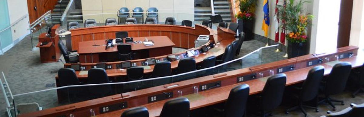 Empty City Council Chambers, gallery seating and meeting circle