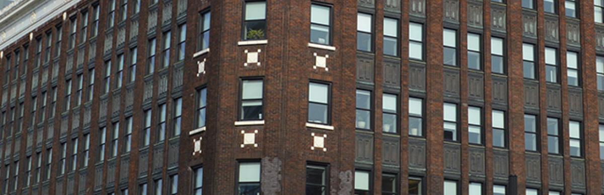 Street view of Lister Block Building at corner of James Street and King William Streets