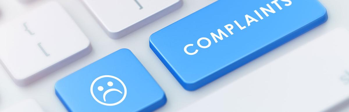 Modern Keyboard with Blue Complaints Button