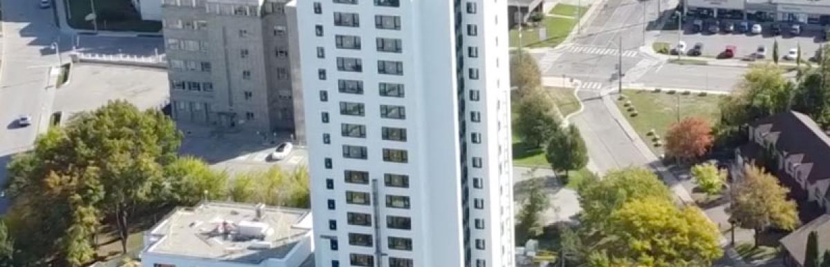 Overhead view of white apartment building