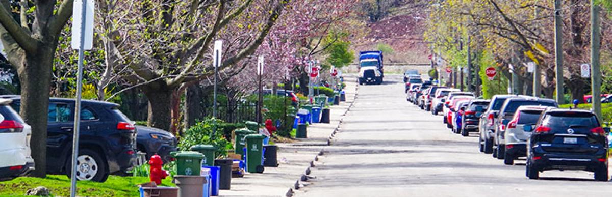 street with waste collection at curb