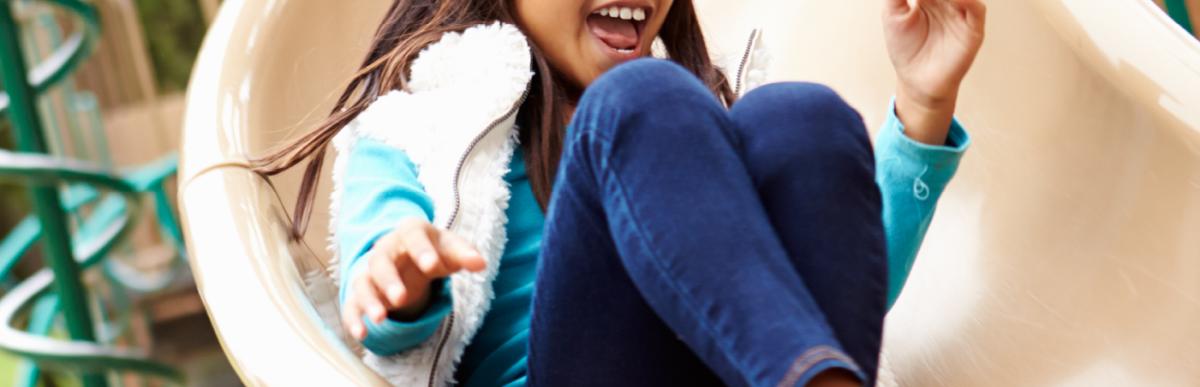 young girl on slide