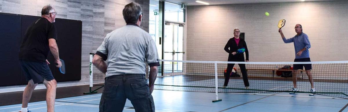 Players on a pickleball court