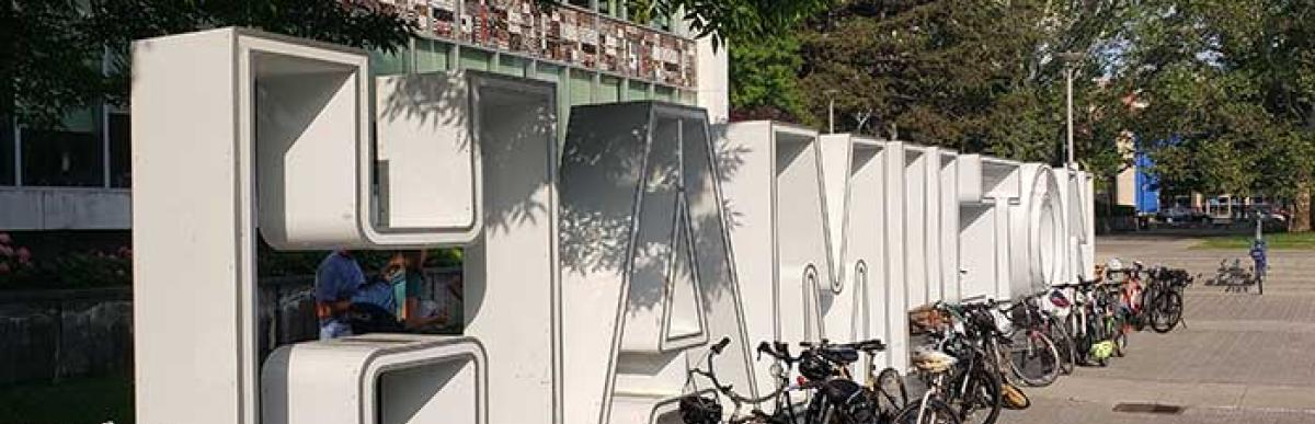 Bikes parked around the Hamilton Sign infront of City Hall