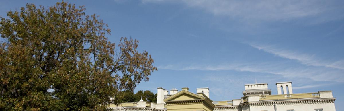 Exterior of Dundurn National Historic Site in summer with green grass and trees