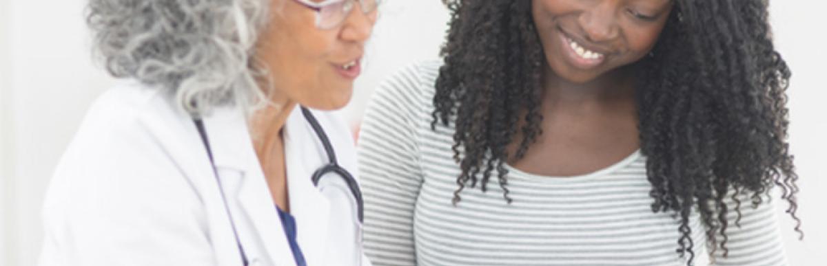 pregnant woman with doctor