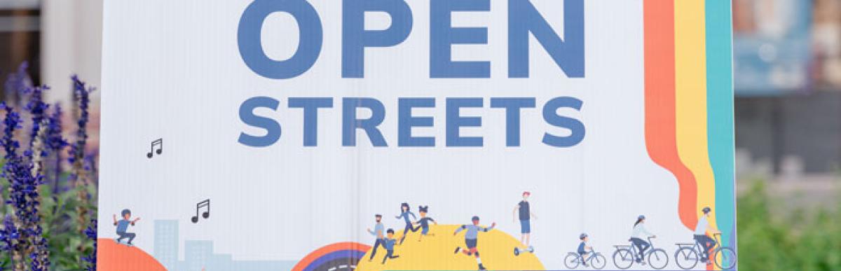 Outdoor signage which says: Welcome to Open Streets Hamilton