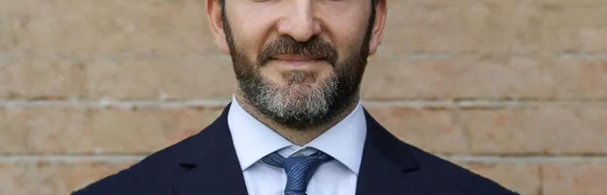 Headshot of Acting Executive Director Yakov Sluchenkov