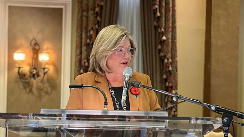 Mayor Horwath giving a speech at a podium