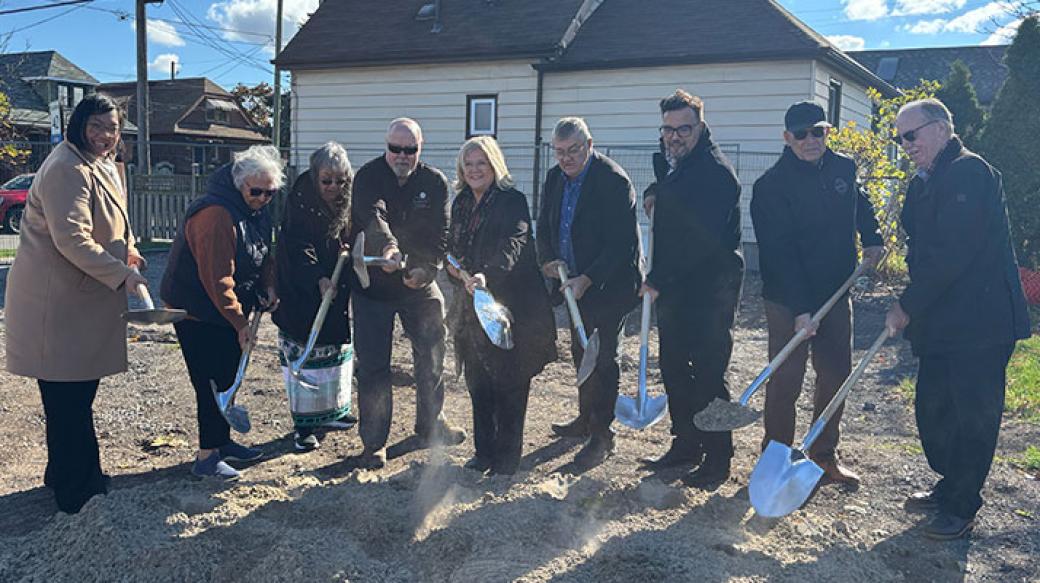 Group of people with shovels at the Kiwanis Homes groundbreaking