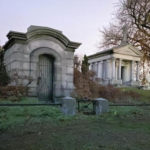 Stone crypt on grassy hill
