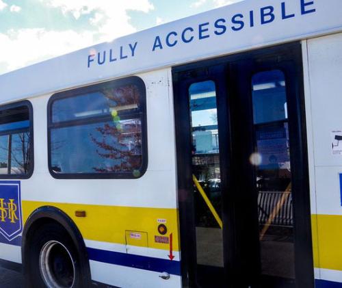 HSR side of bus and entry doors with decal "Fully Accessible"