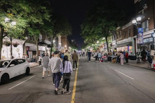People exploring Art Crawl on the street.