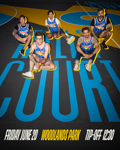 The Arkells (group of men sitting on the ground) wearing basketball jerseys