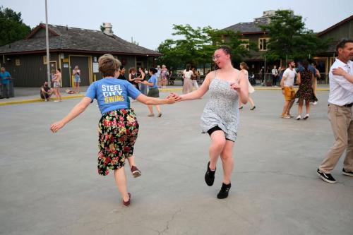 People dancing outdoors