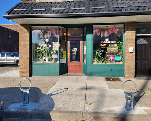 Two hammer hoops for bike parking near sidewalk